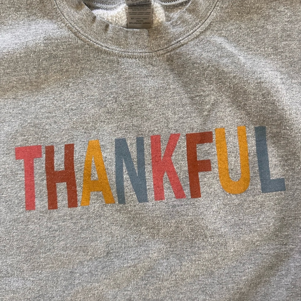 Cute “Thankful” crew neck sweatshirt.